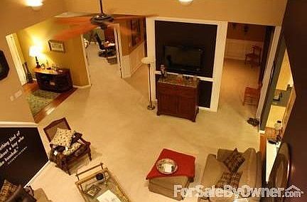 Great room from bonus room : 18 foot ceiling in great room. 9 foot ceilings throughout lower level.