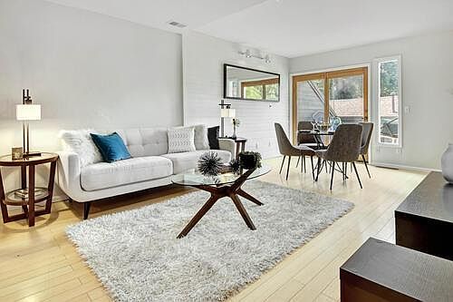 Open concept living room, dining room and kitchen.