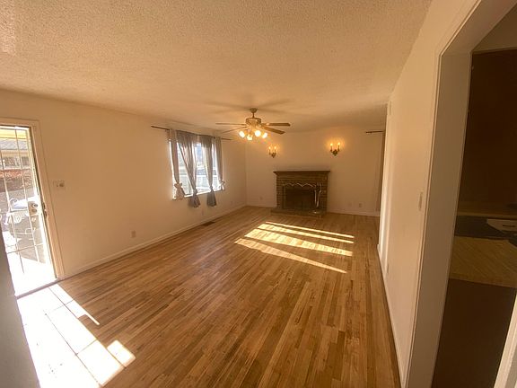 Living room with Wood burning Fireplace