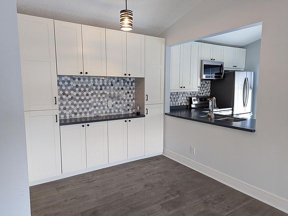 View of kitchen from living room