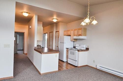 Entry, kitchen, living room.Standard floor layout with slight modifications from unit to unit.