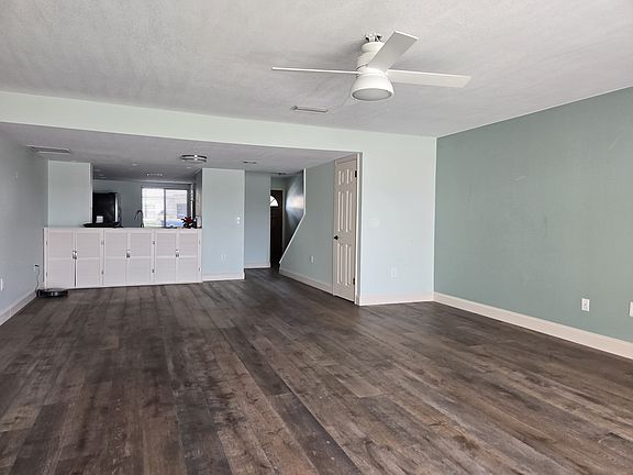 Looking back to Kitchen & Entrance in Living Room