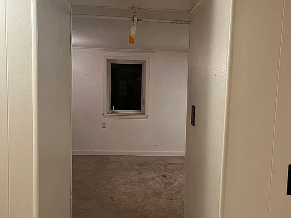 View from the kitchen into the bedroom