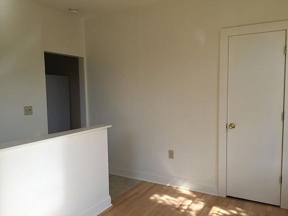 living room looking at top of entry stairs 