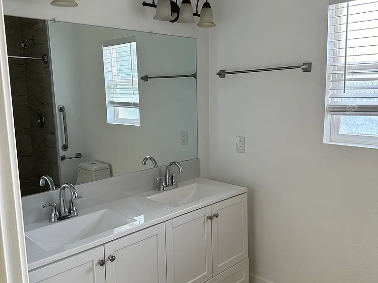 Handicapped shower with grab bars
Wheel chair access.