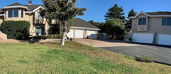 House (left) and guest house