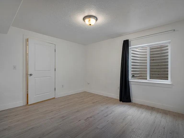 Down stairs bedroom number 4 with walk-in closet.