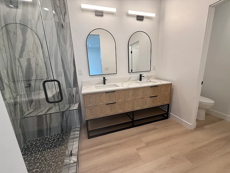 Master bathroom double vanity and separate toilet room