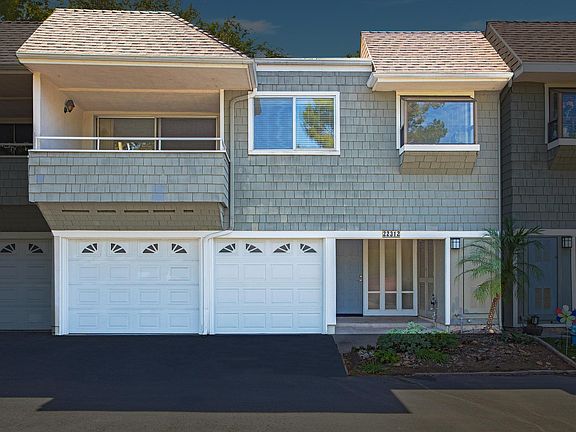 2 story unit with 2-car garage and large covered patio.