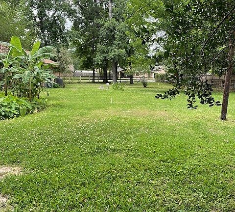 2/3 acre corner lot with fully fenced back yard