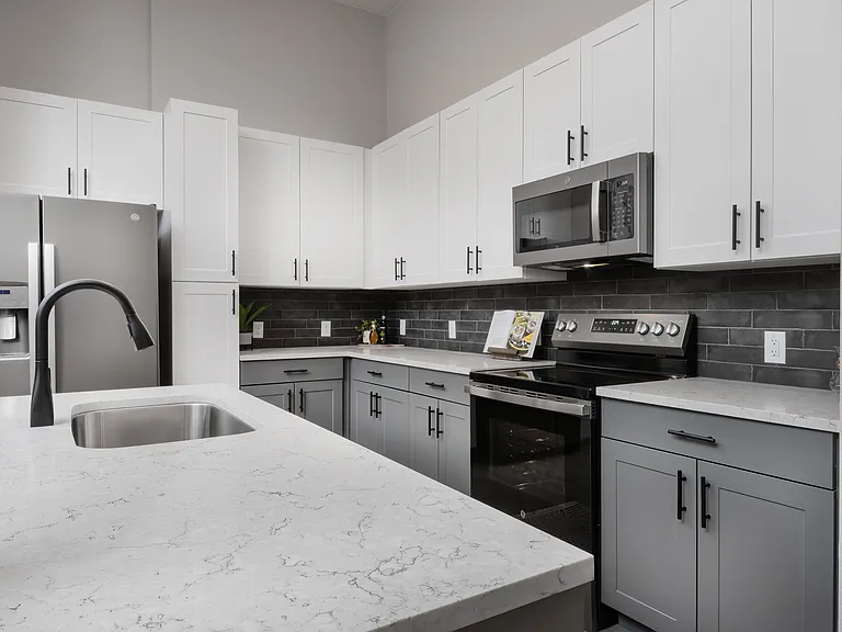 Bright And Spacious Kitchen With White Finishes