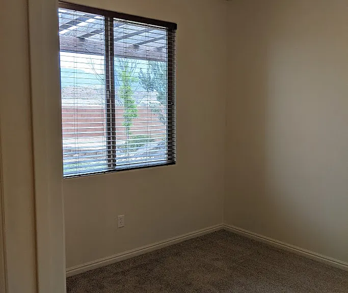 Second Bedroom. 
*New Blinds installed. Not shown in photo.
