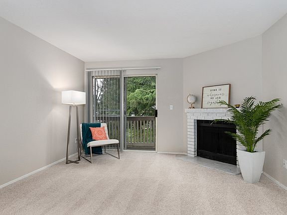 Bayview Apartment Homes Living Room and Backdoor Patio