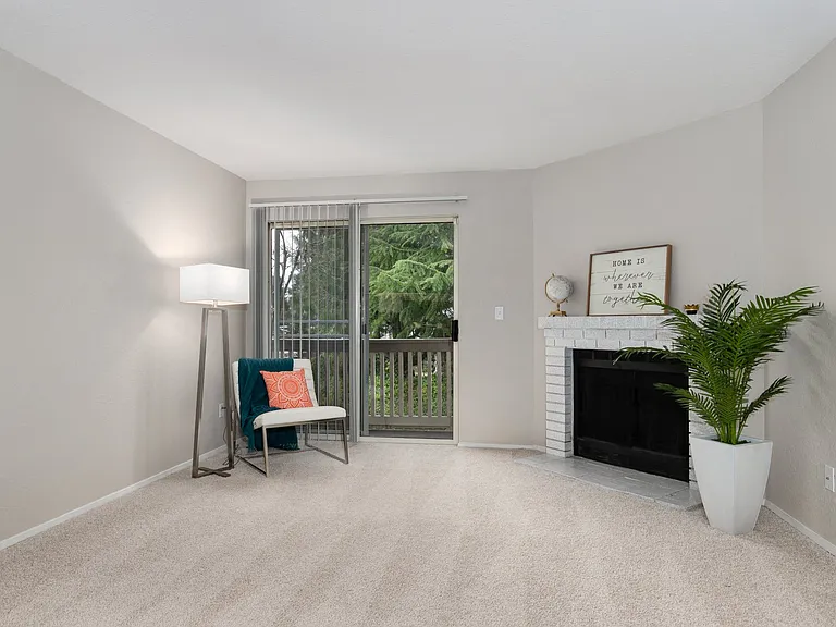 Bayview Apartment Homes Living Room and Backdoor Patio