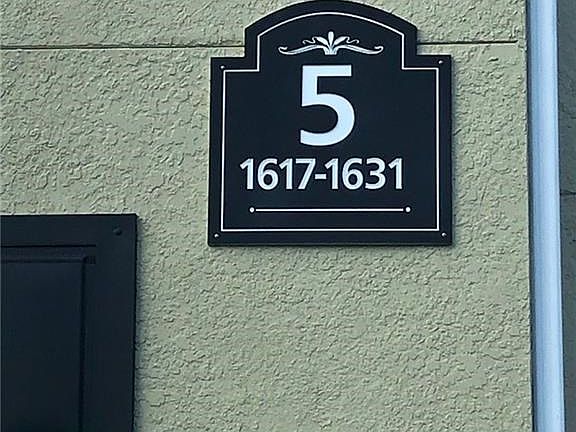 Building # 5, take the sidewalk between the buildings to the fountain, take a right to 1619
