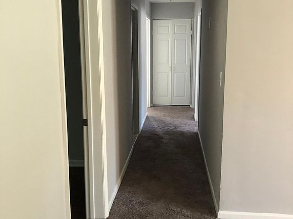 WALL TO WALL CARPETING THROUGH OUT THE HALLWAY