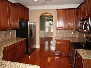 GOURMET KITCHEN W/STAINLESS APPLIANCES,HARDWOODS,GRANITE