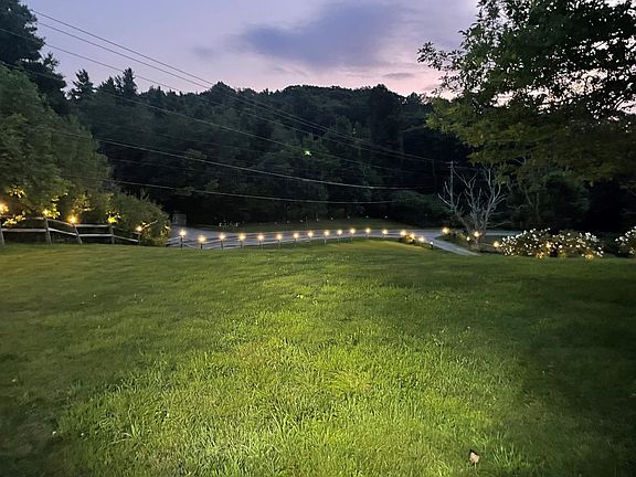 front yard at night the entire proprty is lit up at night