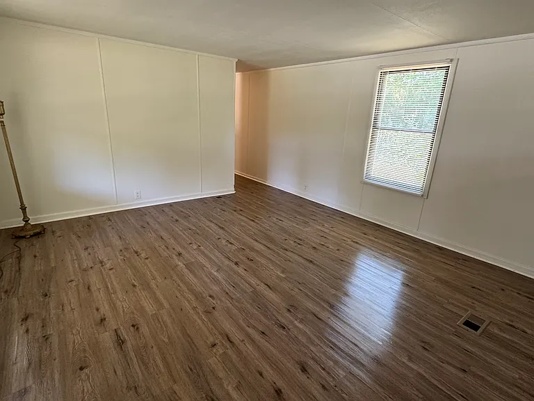 Living space looking towards hallway.