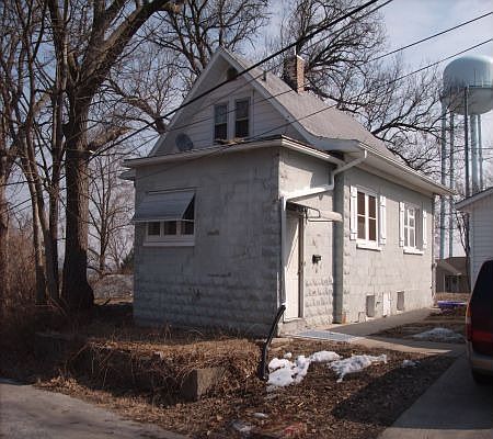 2 car detached garage is to the right.