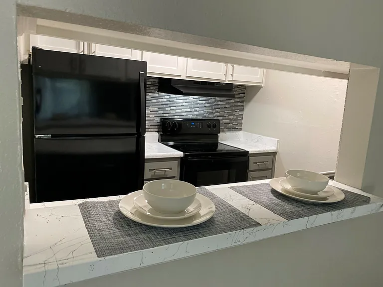 Encanto Apartments — Photo 22