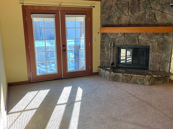 Living room with fireplace.