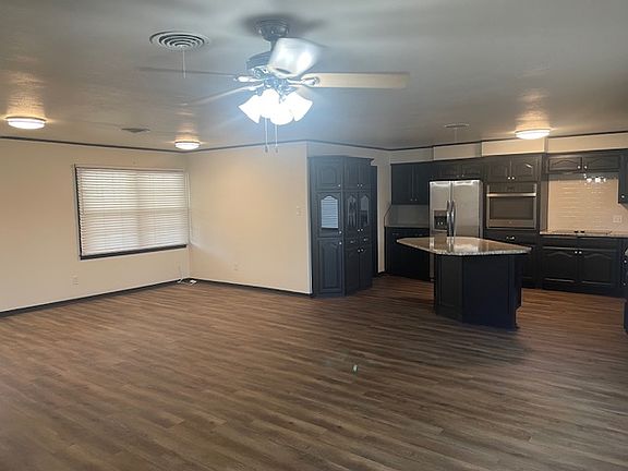 Kitchen and 2 living areas