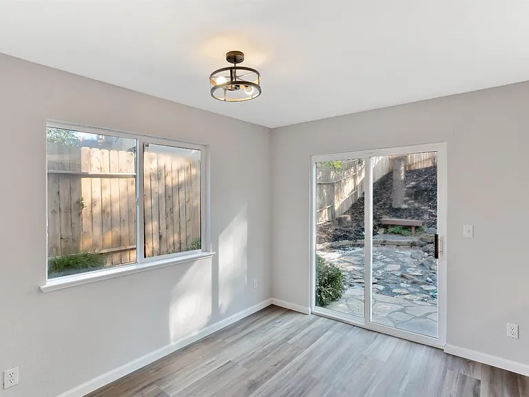 The view of the backyard from the dining room.