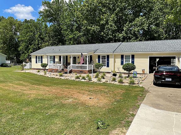 Paved driveway; 2 car garage