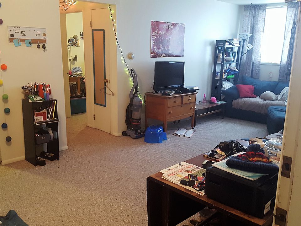 Relatively spacious living room, large closet space next to