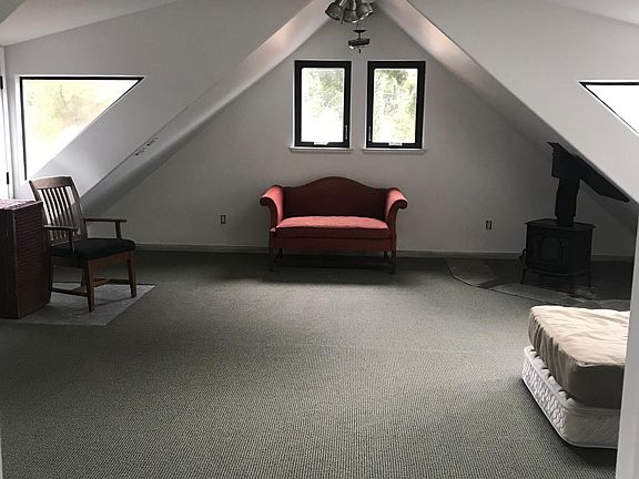 Very large upstairs master bedroom with a lovely wood stove for cozy evenings. Separate entrance very convenient for roommates or visiting guests.