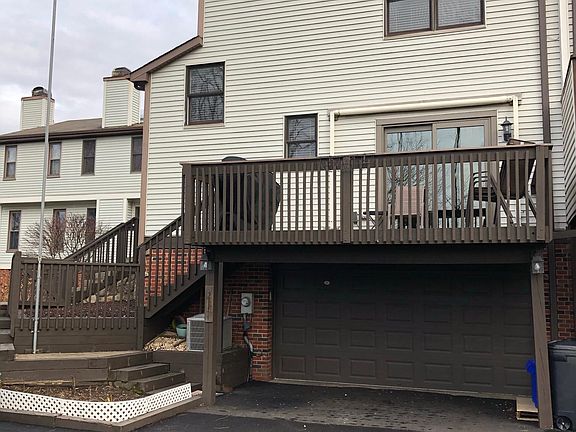Large deck with enclosed gate & 2 car garage