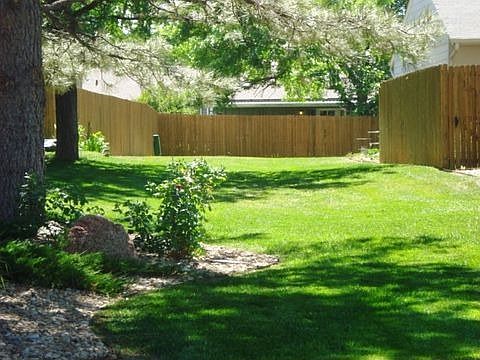 Backs to Grassy Common Area