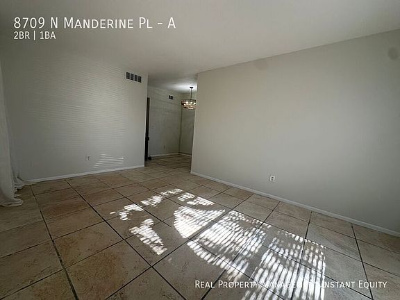 2nd image of 8709 N Mandarine Pl APT A