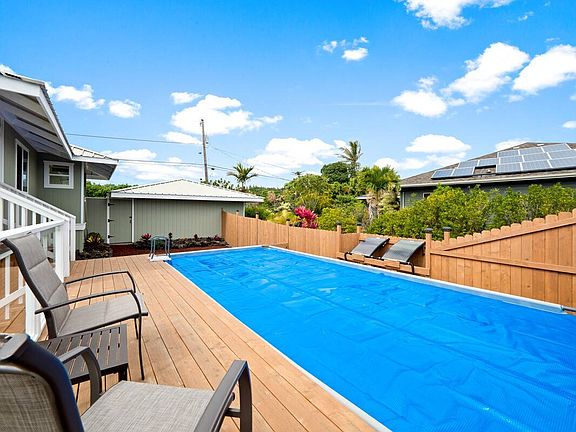 Private solar heated backyard pool is perfect for days when you don't feel like going to the beach
