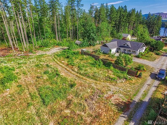 Cedar Fence is built for privacy, however, property is just shy of an acre and extends to this area marked by blue tape (not sho