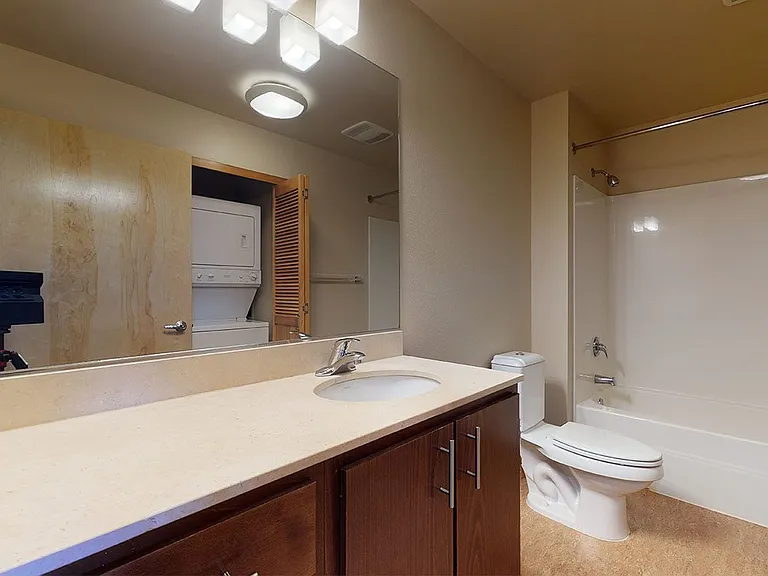 Apartment Bathroom with large soaking tub.