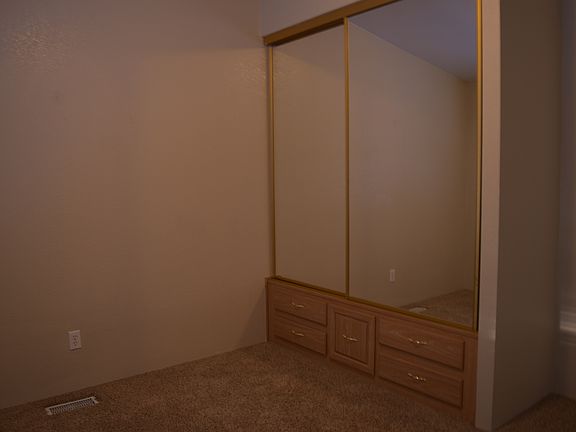 Bedroom 2-mirror closet w/drawers