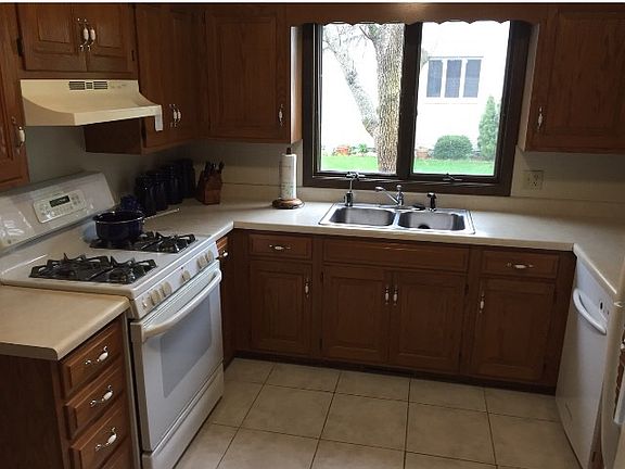 Solid  blonde oak cabinetry