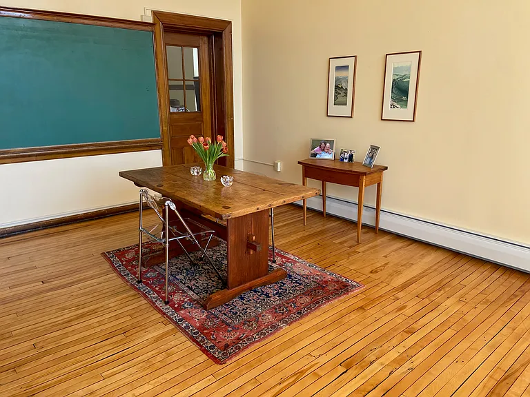 This door leads to 2nd bedroom which is an amazing office or small bedroom. It has a huge window and a closet.
