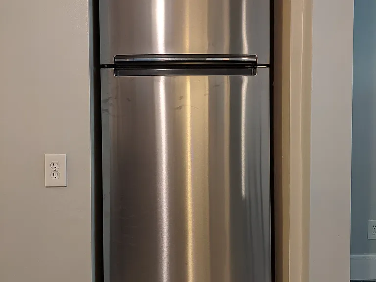 Modern stainless steel refrigerator.
