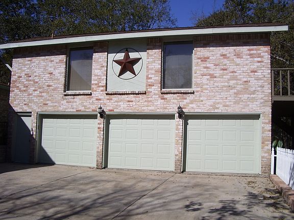 Three-car garage with 800 sq ft apartment on top.
