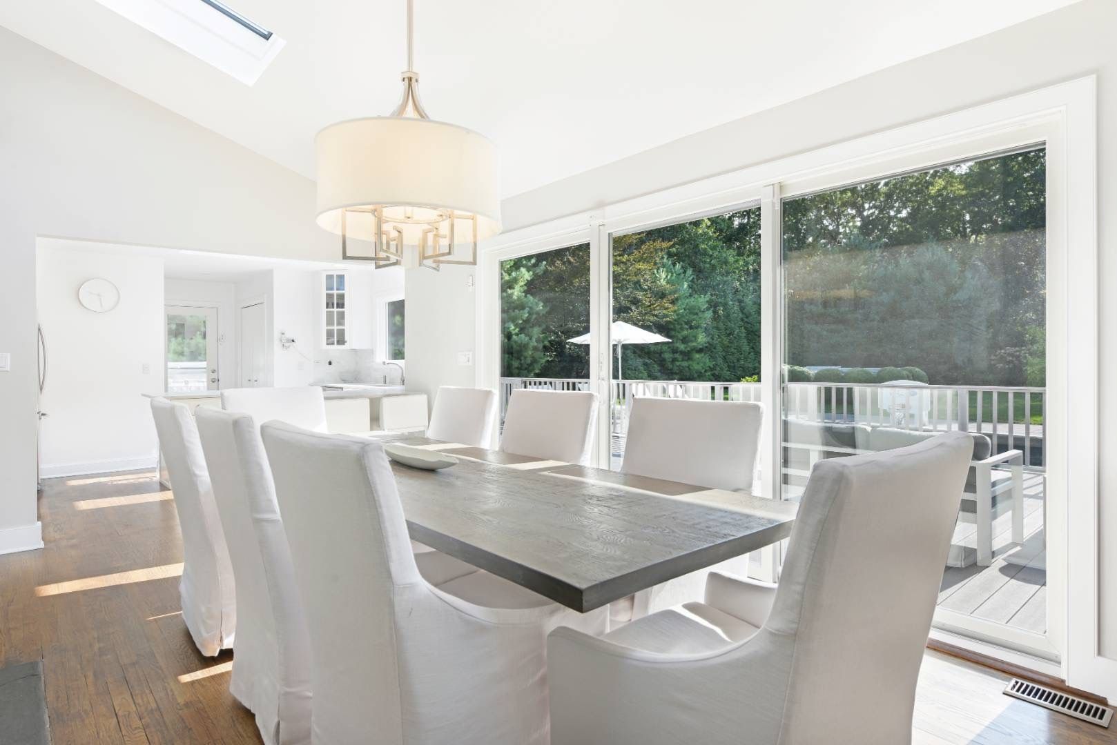  Dining room with permanent seating for 8 comfortably up to 12