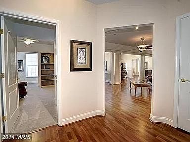 Entry looking at 3rd bedroom on left and Great Room on right