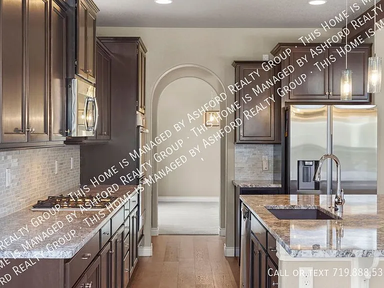 7215 Rim Bluff Ln — Photo 13