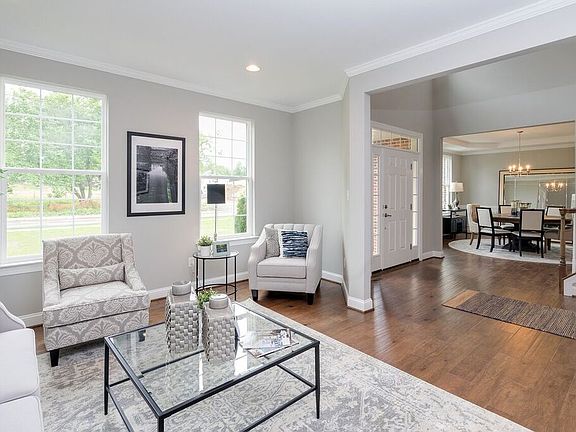 Living room with white furniture in 410 Oxford Drive from hallmark homes