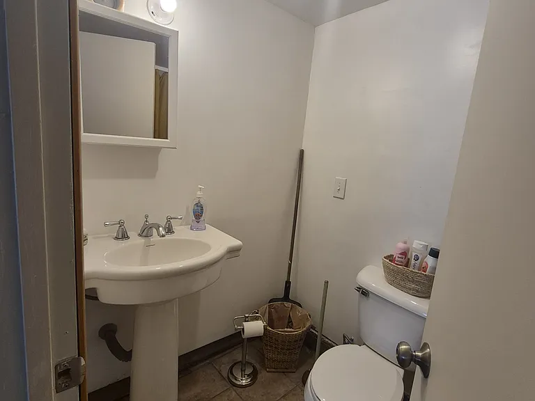 Bathroom, there is a stand up shower on the other side.