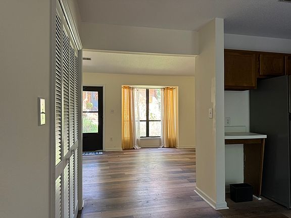 Lots of natural light with views. Laundry closet with light, storage shelves and W/D hookups.