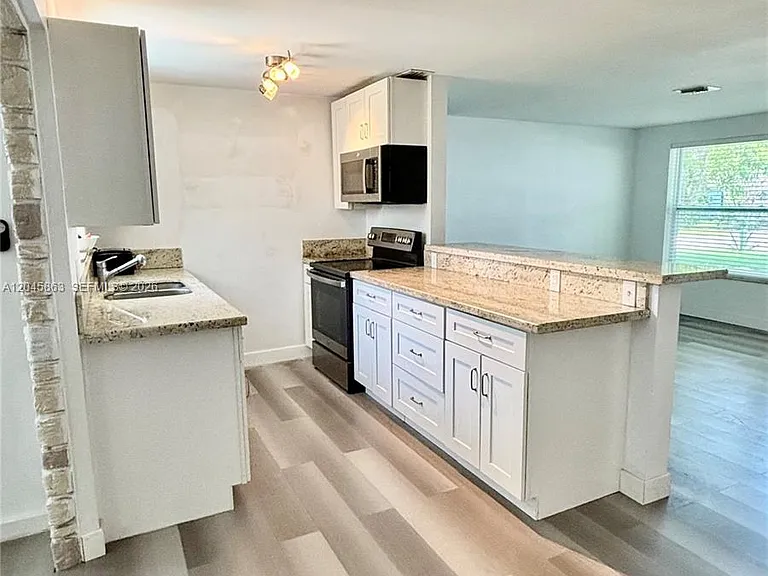 5809 Sullivan Rd — Photo 5