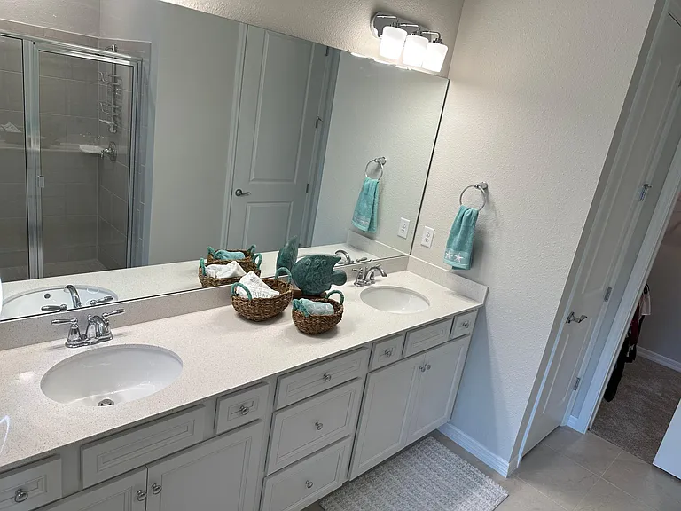 Owner's bath double sink vanity, quartz counters.